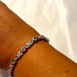 Authentic topaz bracelet with silver and gold